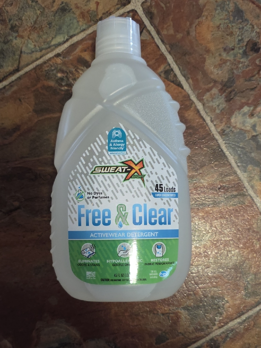 Sweat X Free & Clear Activewear Detergent - Clear Bottle with Blue & Green Label